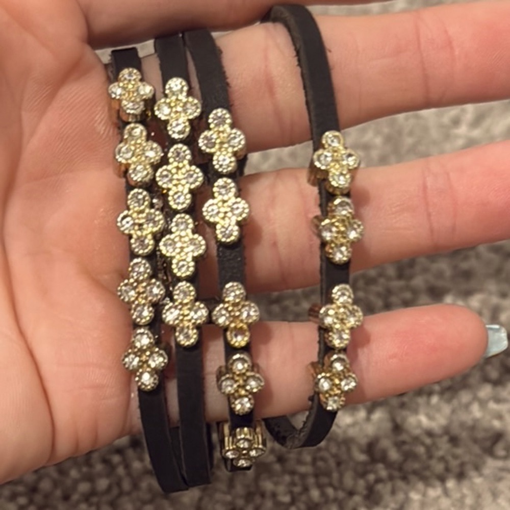 Black Bracelet with Gold Floral Accents and Magnetic Closure